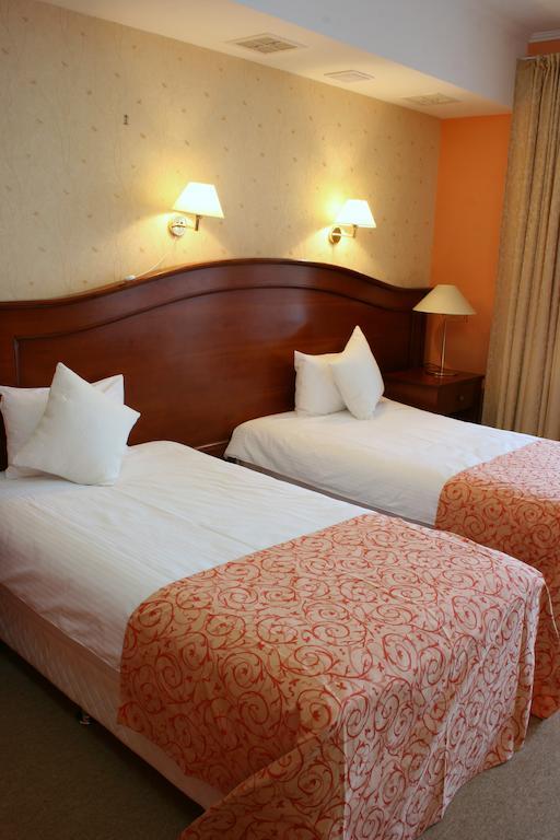 Premier Hotel Shafran Sumy Habitación foto